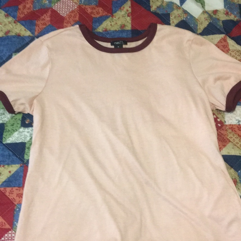 Pink tee with maroon color on sleeve and neck hem